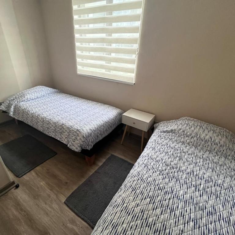 Moderno departamento con WiFi, y estacionamiento en Coronel - Apartamento de 2 dormitorios - 19