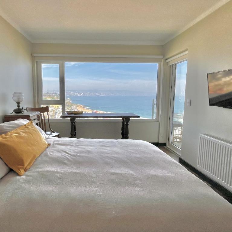 Altavista Reñaca - Fogón, quincho y piscina con vista al mar - Villa - 12
