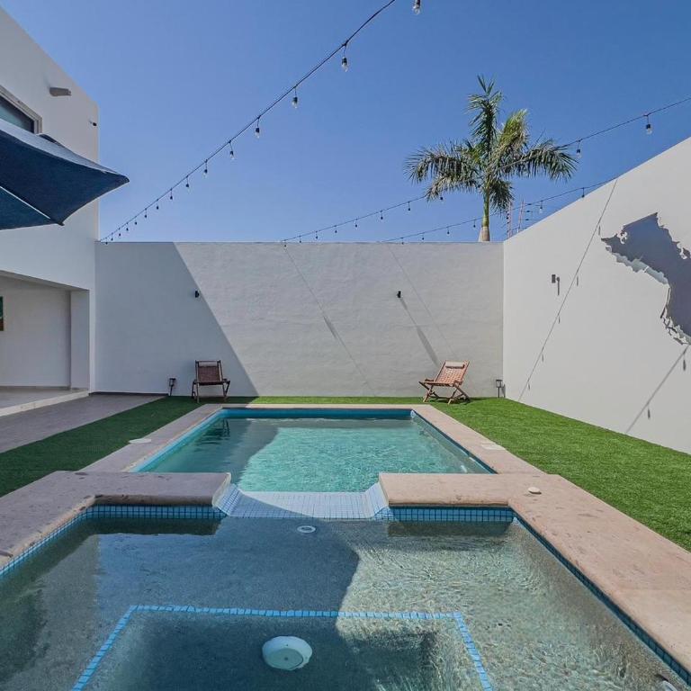Casa Delfines, 2Br home in quiet neighborhood 10 min from downtown - Two-Bedroom Apartment - 5
