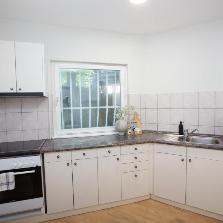 Lumiere Garden Apartment - Two-Bedroom Apartment with Garden View - 13
