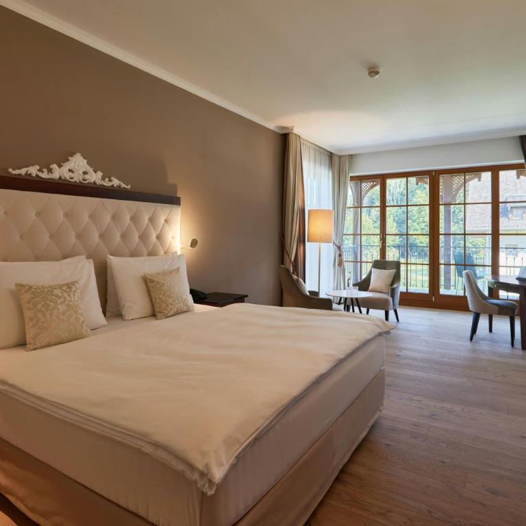 Arabella Jagdhof Resort am Fuschlsee, a Tribute Portfolio Hotel - Junior Suite mit Kingsize-Bett, Gartenblick und Balkon - 1