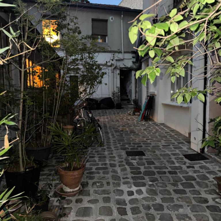 Ancien Atelier Artistique sur Cour Privée - Appartement Paisible en Rez-de-Chaussée - Appartement 2 Chambres - 7