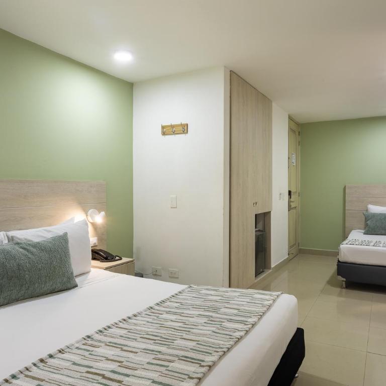Hotel Suite Comfort - Habitación Triple - 2