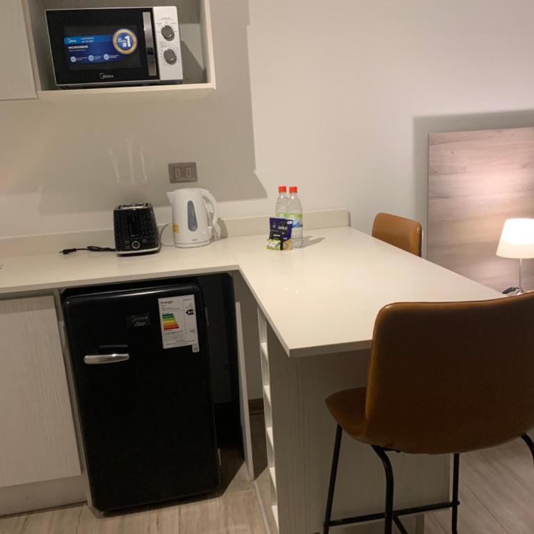 Urban Suites Apart Hotel con Estacionamiento Gratuito - Studio Apartment with King Bed - 7