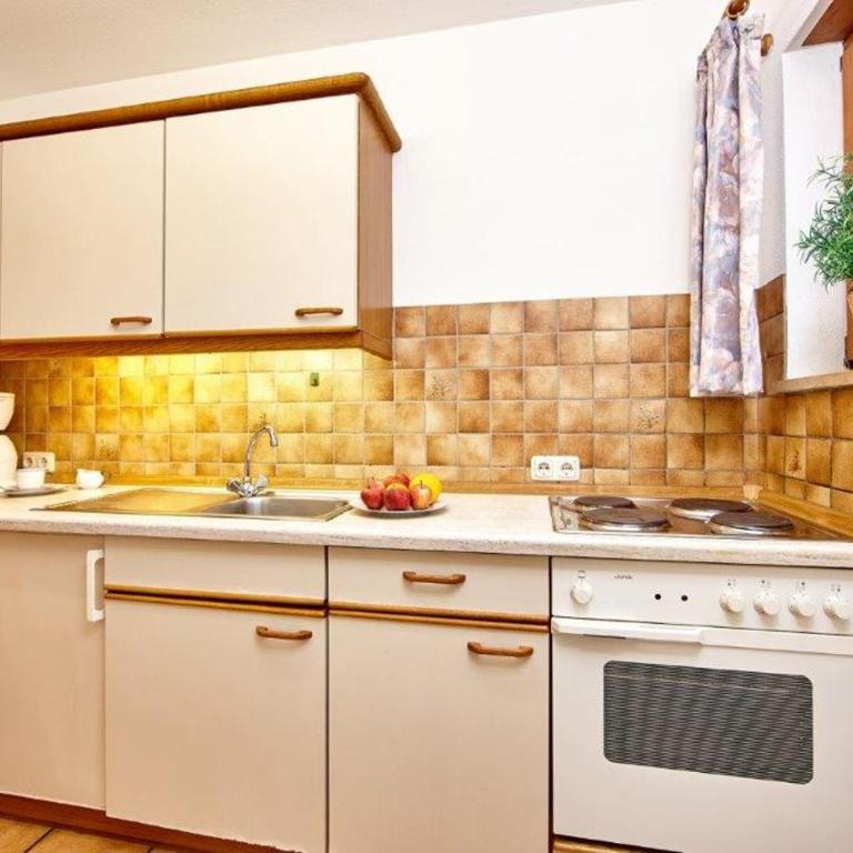 Herzstücke Ferienwohnungen - Apartment mit 1 Schlafzimmer, Balkon und Bergblick - 7