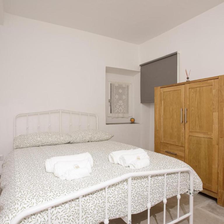 Caffaro Home - Appartamento con 2 Camere da Letto - 46