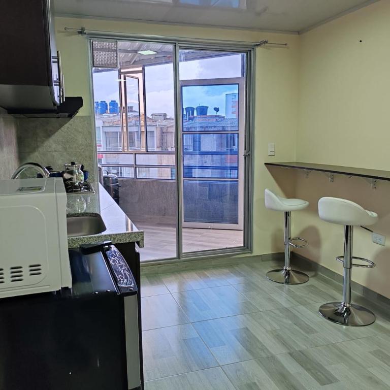 Acogedor & Exclusivo ApartaSuite cerca al centro comercial viva, unicentro y Uptc - Two-Bedroom Apartment - 13