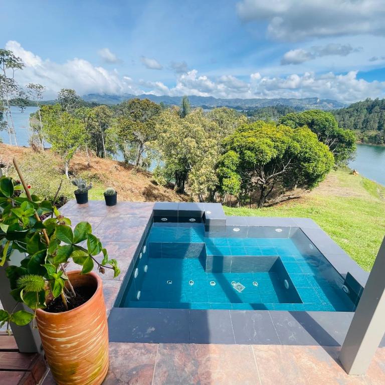 Casa garuda, hermosa cabaña con vista a la piedra de El Peñol - Five-Bedroom House - 36