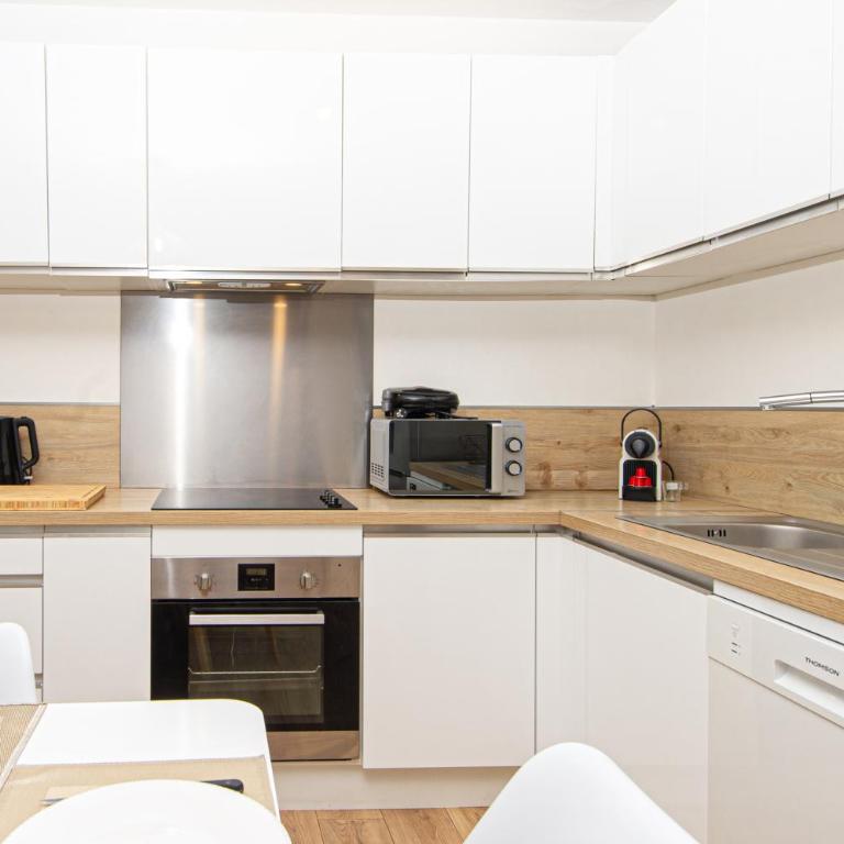 Ensoleillé et Spacieux - Jardin - Parking - ED - Appartement 2 Chambres - 13