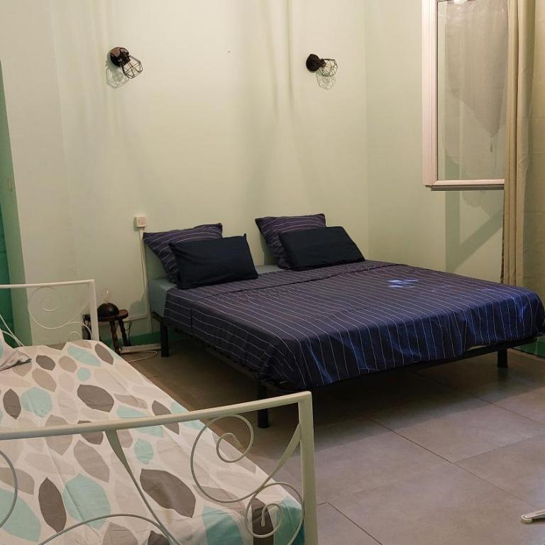 chambre dans villa - Chambre Double - Vue sur Jardin - 1