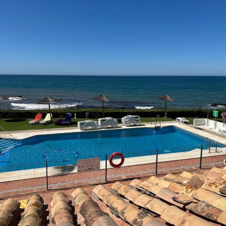 Escapada frente al mar con piscina y parking - Apartamento de 1 dormitorio - 25