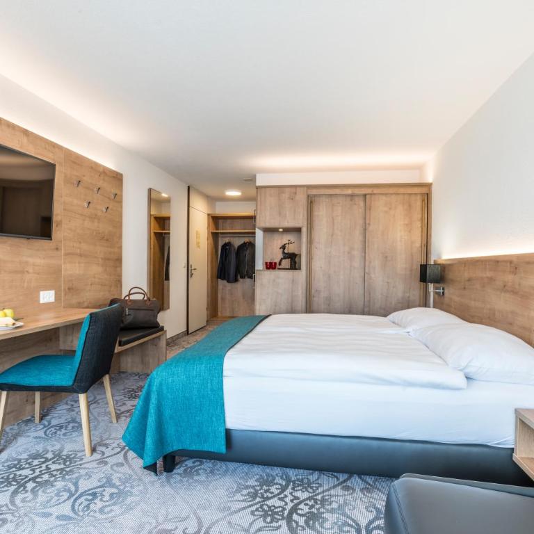 Central Sporthotel Davos - Superior Zimmer West mit Balkon - 9