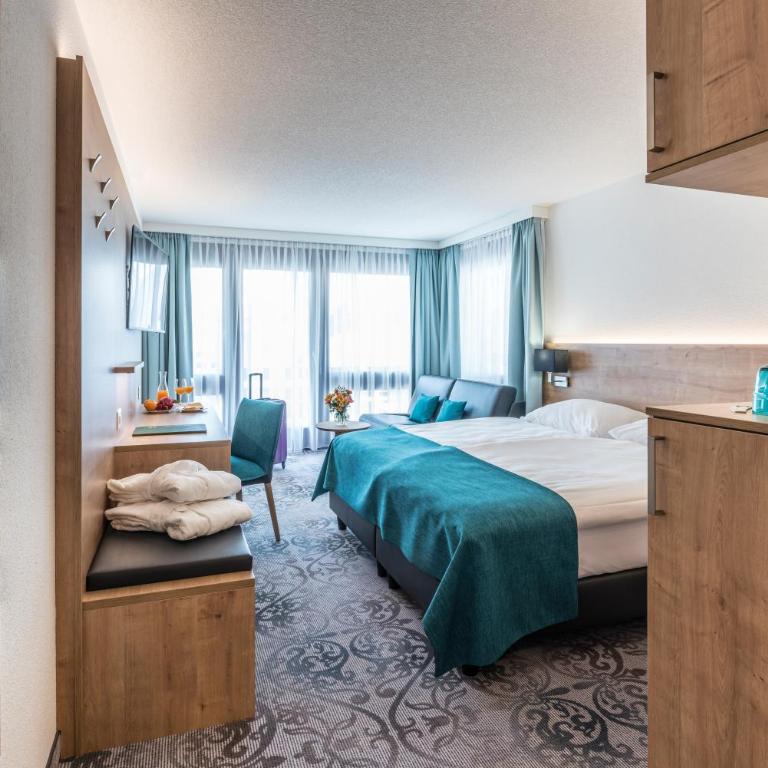 Central Sporthotel Davos - Superior Zimmer West mit Balkon - 1