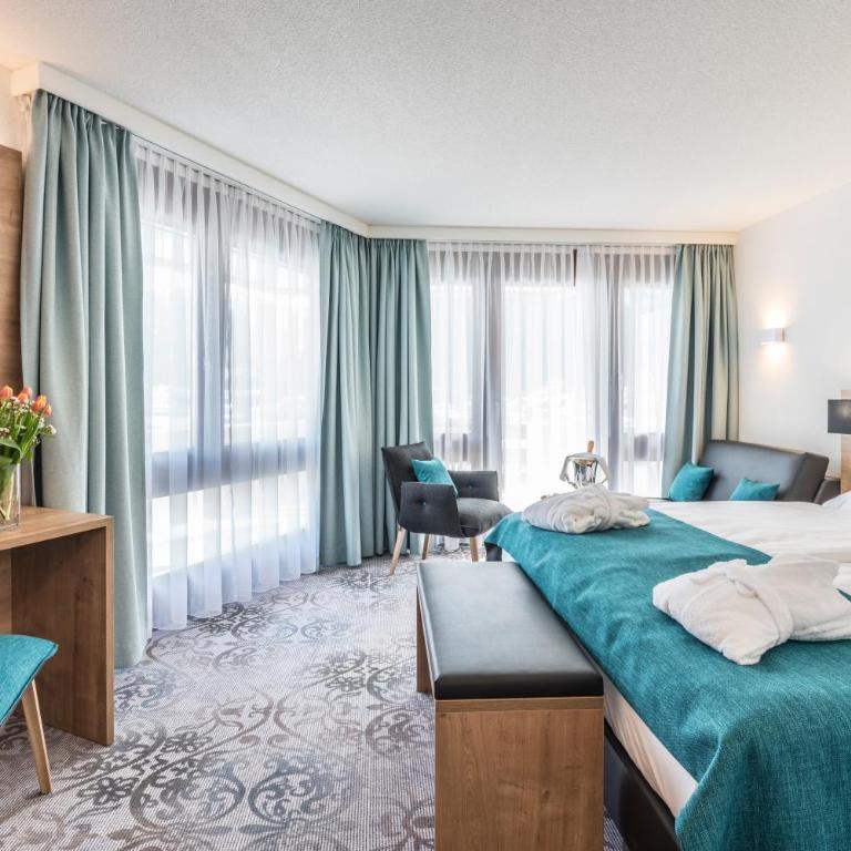 Central Sporthotel Davos - Superior Zimmer West mit Balkon - 13