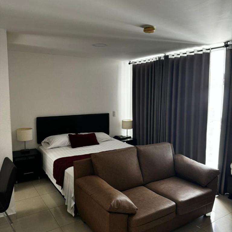 Elegante y Confortable Suites - Apartamento de 1 dormitorio - 1