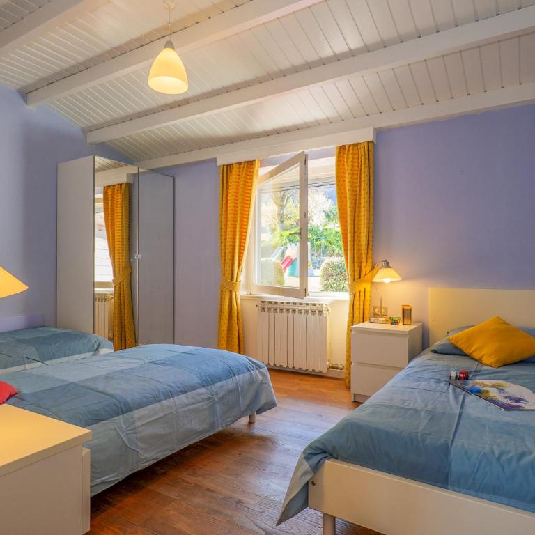 Sole 1 Terrassen Ferienwohnung mit Pool OG - Appartamento con Vista Lago - 13