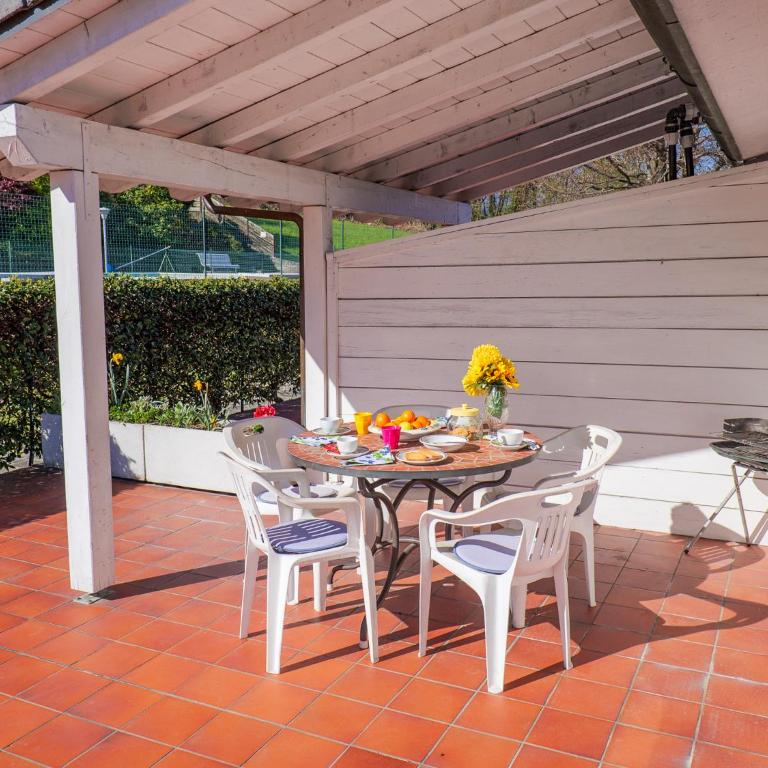 Sole 1 Terrassen Ferienwohnung mit Pool OG - Appartamento con Vista Lago - 16