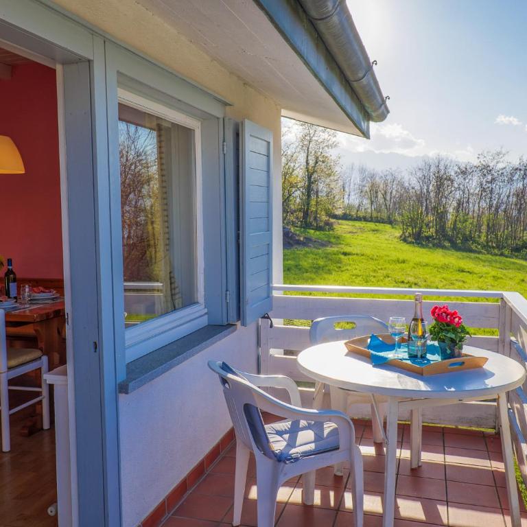 Sole 2 Terrassen Ferienwohnung mit Pool OG - Appartamento con Vista Lago - 13