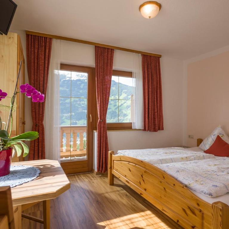 Gästehaus Rahm - Familie Wechselberger - Apartment mit Aussicht und Balkon - 14