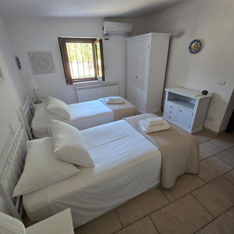 Trullo Olivia con piscina riscaldata, natura e relax - Three-Bedroom House - 39