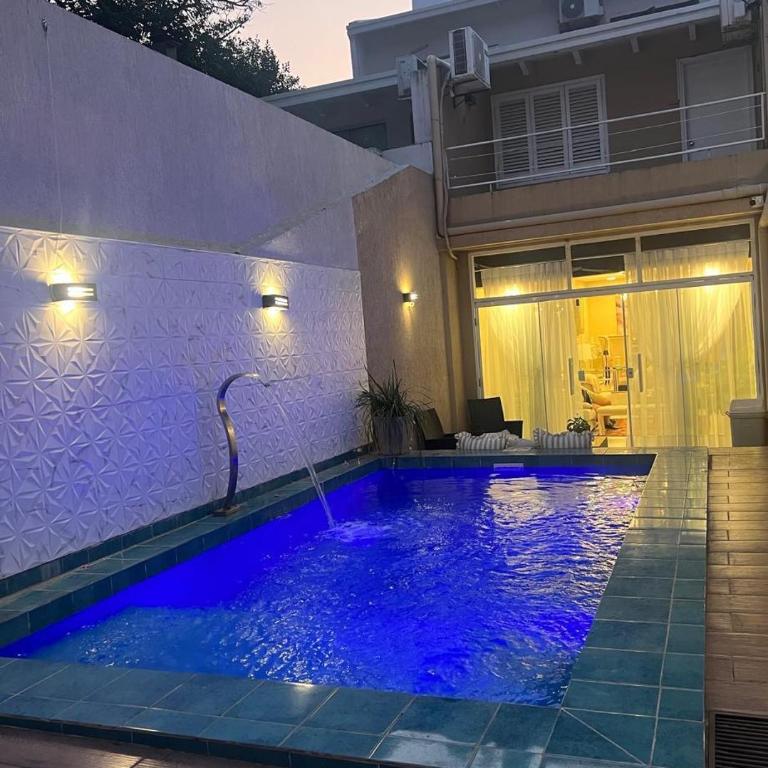 Casa con piscina privada en Asunción, Paraguay - Three-Bedroom House - 23