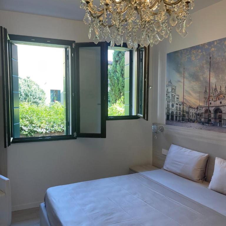 Casa sulla Laguna CASTELLO - Camera Matrimoniale con Vista Giardino - 11