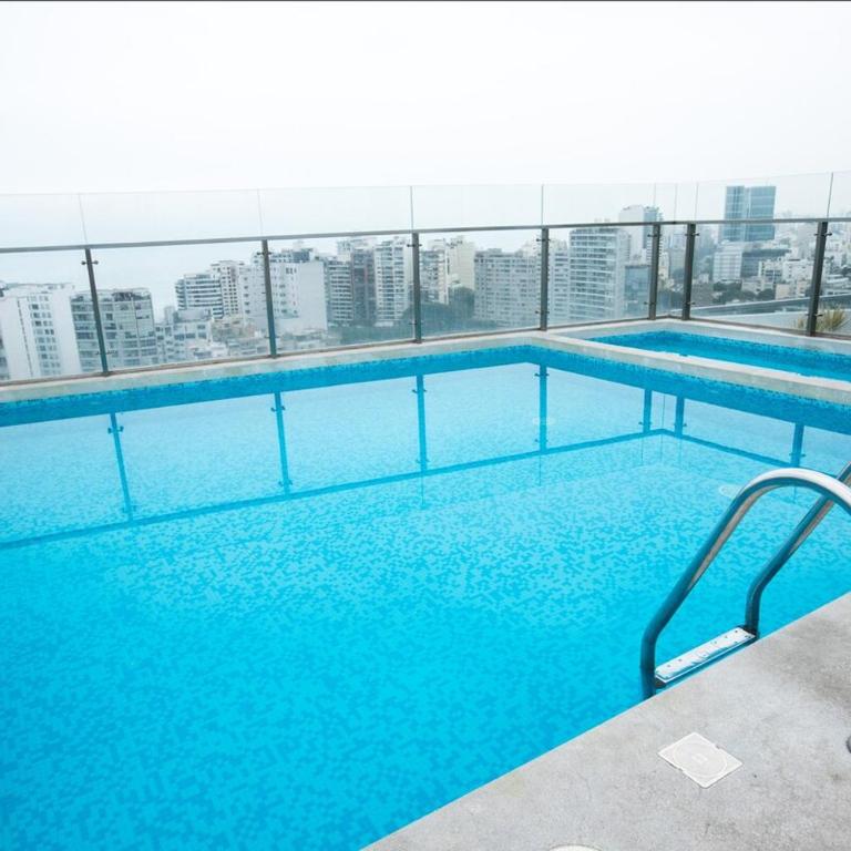 iStay Moderno Loft Piscina BBQ Gym Bicicletas - One-Bedroom Apartment - 9