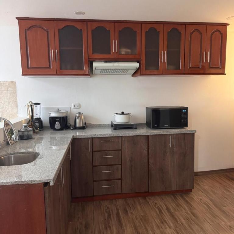 Departamento moderno con vista a los volcanes en el 1er piso - Three-Bedroom Apartment - 9