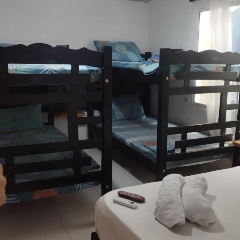 Hostal Mar y Arena - Habitación Cuádruple Económica con baño compartido - 11