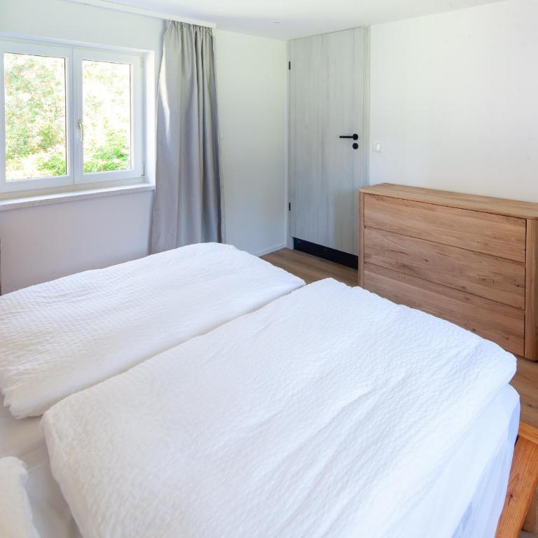 Landhaus Auerling, Chalet am Wald mit Sauna, Kamin & Garten - Chalet mit 3 Schlafzimmern - 26