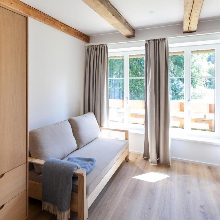 Landhaus Auerling, Chalet am Wald mit Sauna, Kamin & Garten - Chalet mit 3 Schlafzimmern - 6