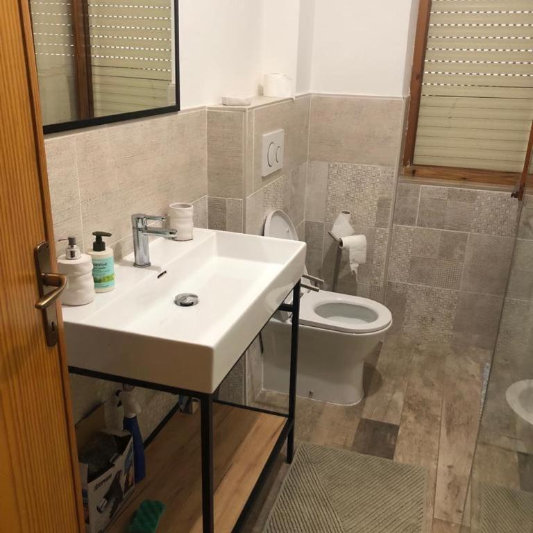 Casa Magnolia - Appartamento con 2 Camere da Letto e Vista Giardino - 9
