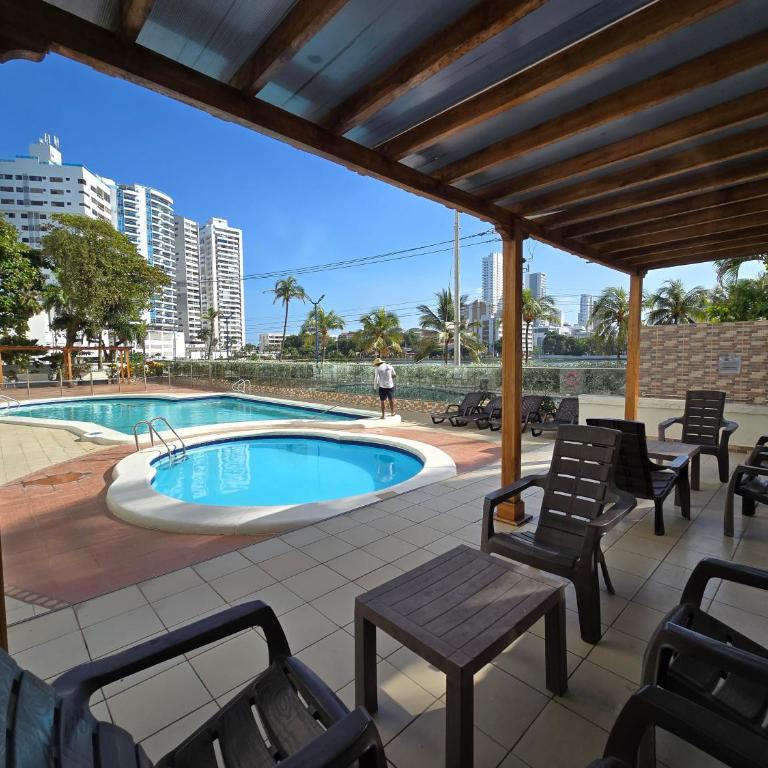 Moderna suite con balcón a pasos de la playa - One-Bedroom Apartment - 17