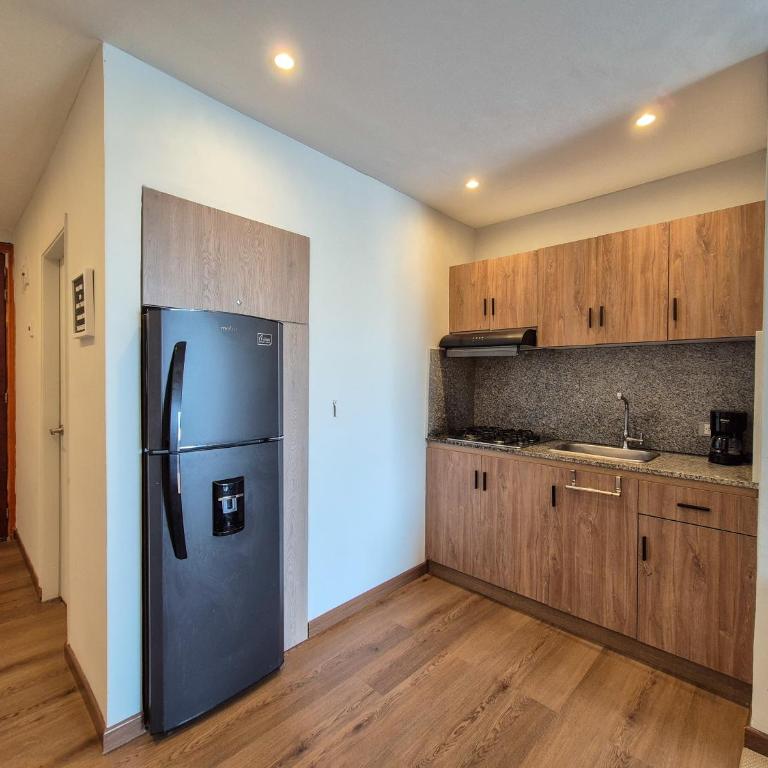 Moderna suite con balcón a pasos de la playa - One-Bedroom Apartment - 11