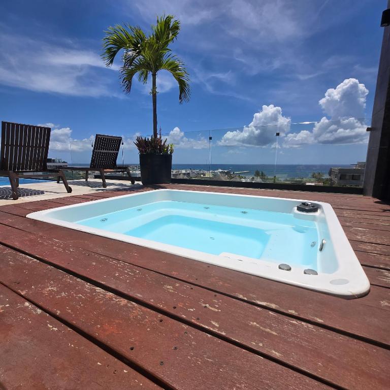 A Perfect Place - Rooftop views of the Caribbean - Jacuzzi - One-Bedroom Apartment - 4