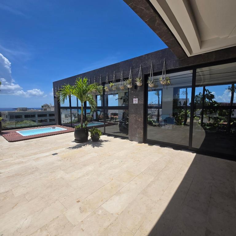 A Perfect Place - Rooftop views of the Caribbean - Jacuzzi - One-Bedroom Apartment - 9