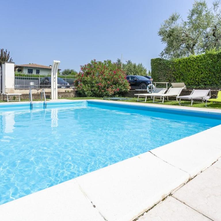 HOST4U - CASETTA di VIOLA con Piscina e Parcheggio a due passi dal Lago di Garda - Appartamento con 1 Camera da Letto - 4