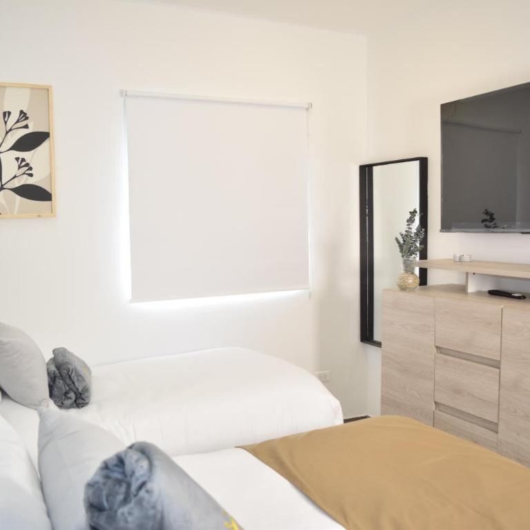 Apartamento familiar a 10 min de Monserrate - Apartamento de 3 dormitorios - 40