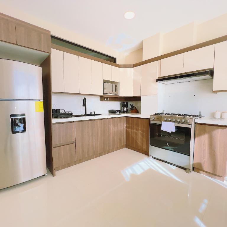 Sofisticado Departamento Central en Loja - Apartamento de 2 dormitorios - 11