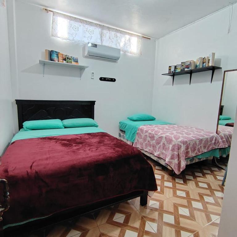 Cuarto en galápagos - Habitación Doble Económica - 2 camas - 4