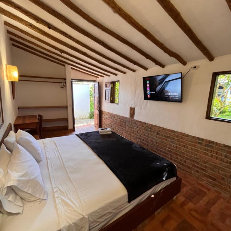 Eco-Hotel Casa de Oracion Barichara "Pet friendly" - Suite Junior con vistas al jardín - 3