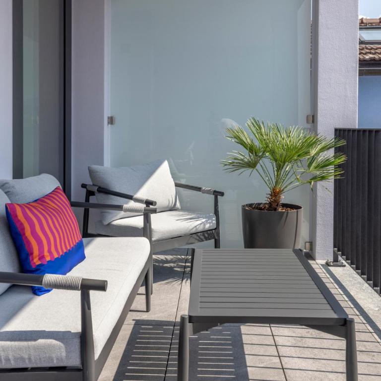 Living Ascona Boutique Hotel - Junior Suite con Terrazza e Vista Parziale Lago - 1