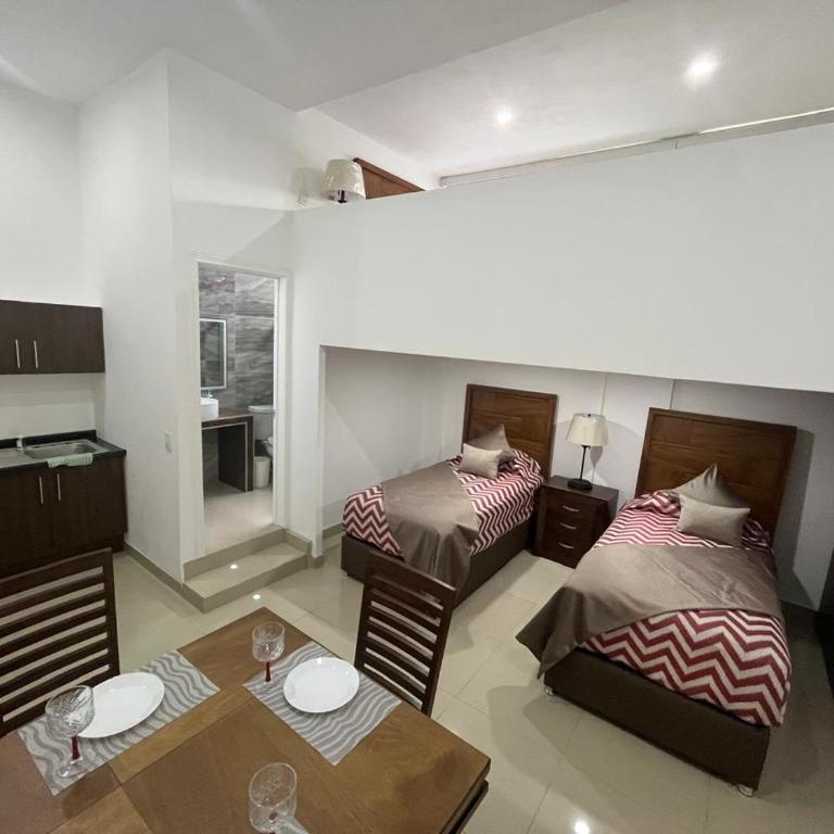 La casa de las palmeras - Suite Estándar - 6