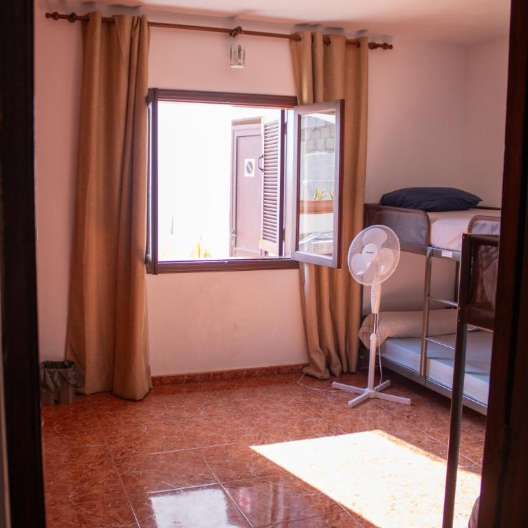 Hostel Banana Surf House - Cama en habitación compartida masculina de 4 camas - 6