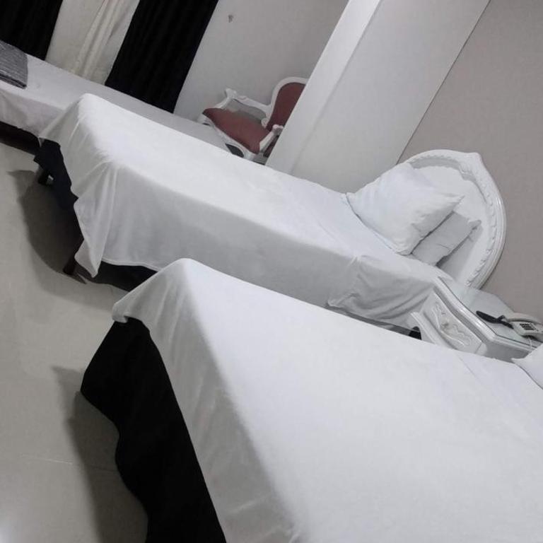 Hotel Suite Santa Rosa - Habitación Cuádruple Económica - 1