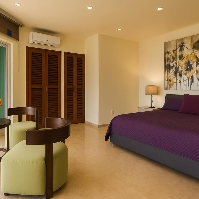 Luxury Ocean Frontage Boutique Suites - Suite con cama extragrande y vistas a la piscina - 15