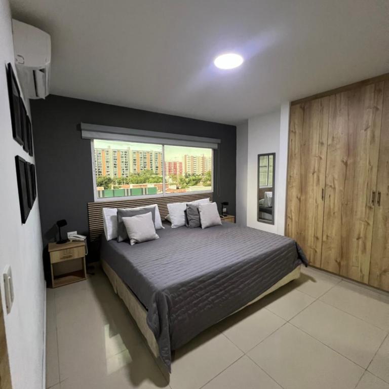 Aparta Suites La Flora- Infinity Living - Apartamento de 2 dormitorios - 50