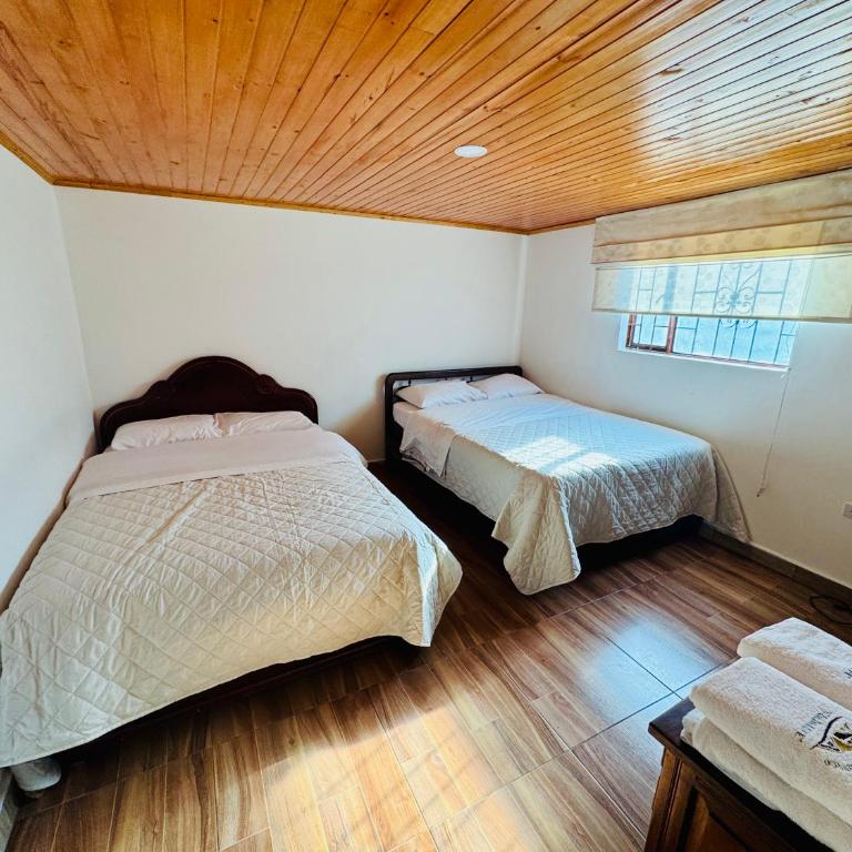 Hostal Agroturistico Guadalupe - Twin Room with Private Bathroom - 1
