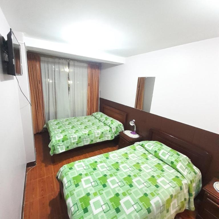 Hotel Central - Habitación Doble con cama supletoria - 4