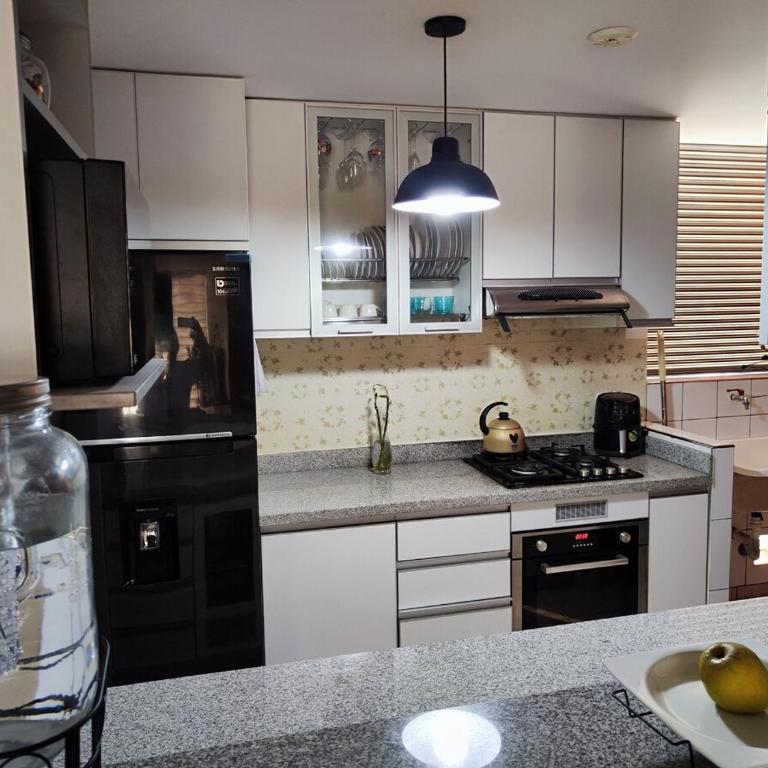 Acogedor departamento con cochera - Two-Bedroom Apartment - 2